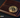 close-up image of a bitcoin coin resting on a dark cryptocurrency wallet, symbolizing digital currency security and privacy in crypto transactions