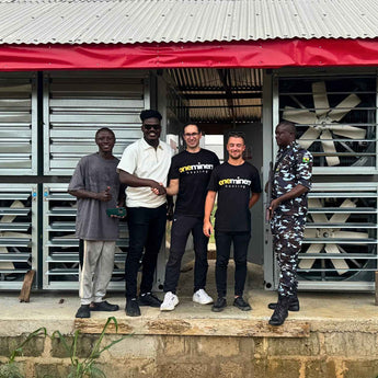 Visit to Nigeria with OneMiners hosting team, outside the mining facility.